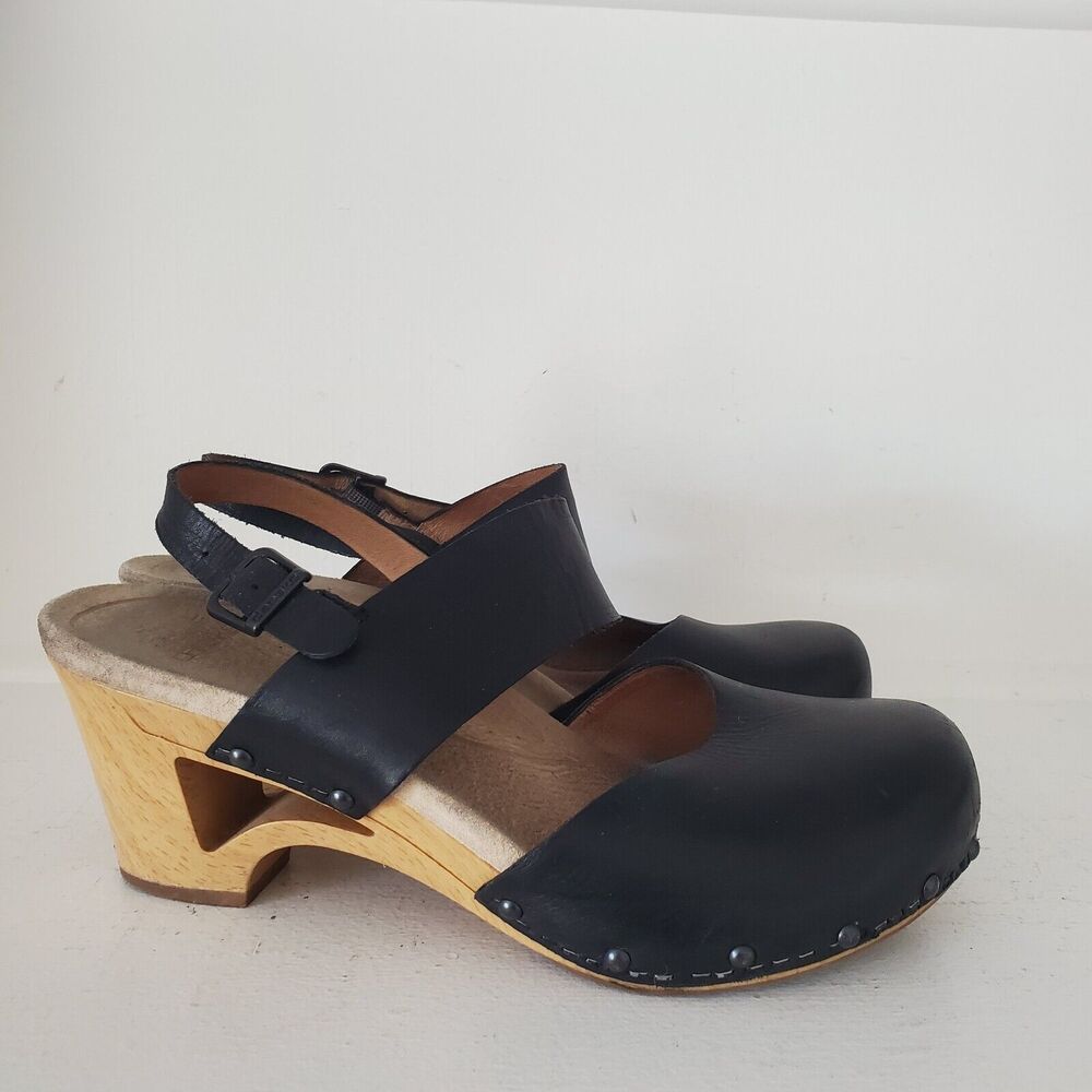 Dansko Black Leather Clogs with Tan Heel